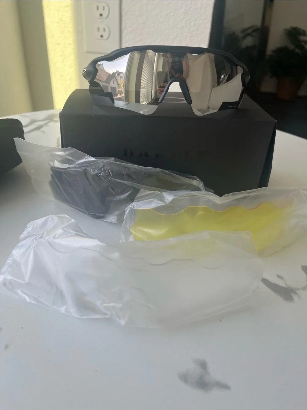 Oakley Black Frame Sunglasses with Silver Mirror Lens